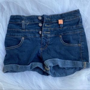 Dark blue high waisted jean shorts.